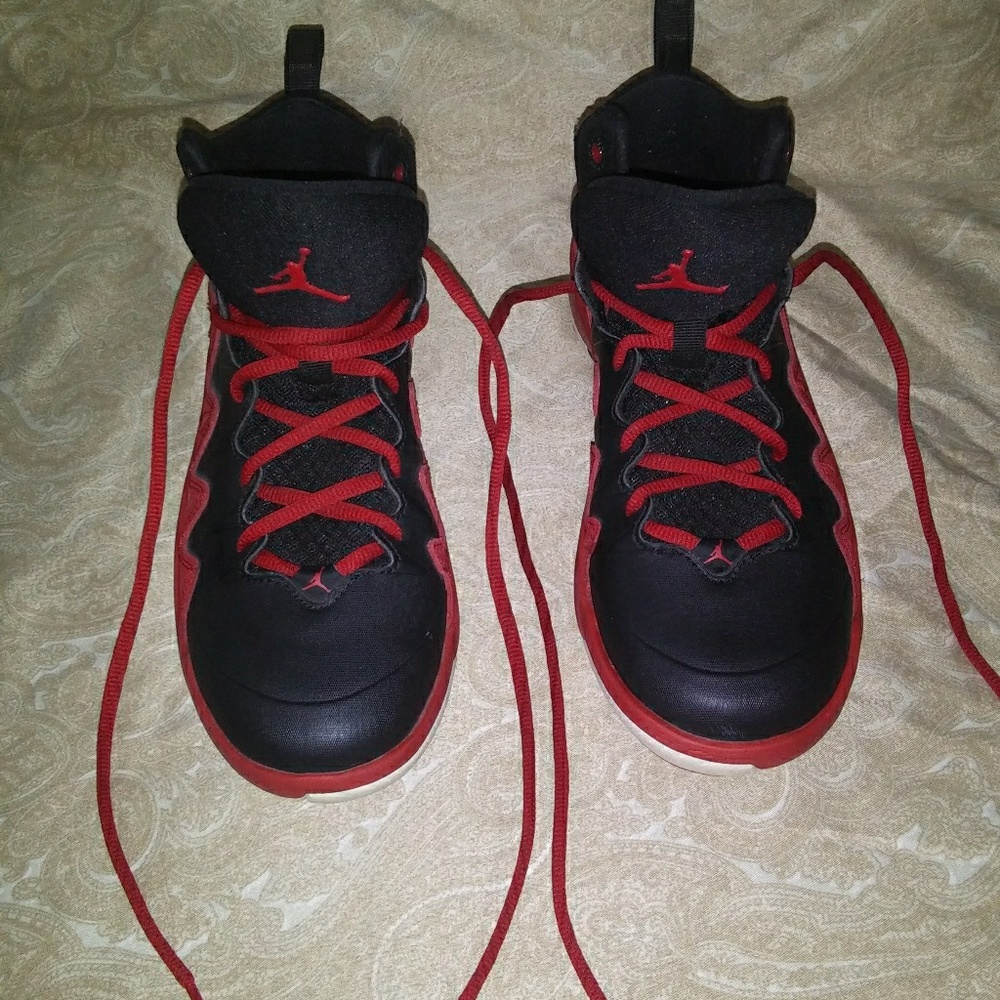 Jordans, Red and black, Size 5.5 (in mens)
